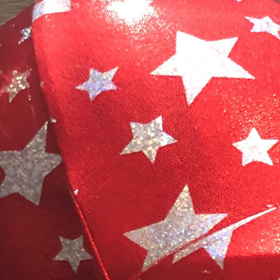Red with Silver Stars

Lycra Helmet Cover will fit most riding helmets 
Ribbon Bow can be added in any colour just ask